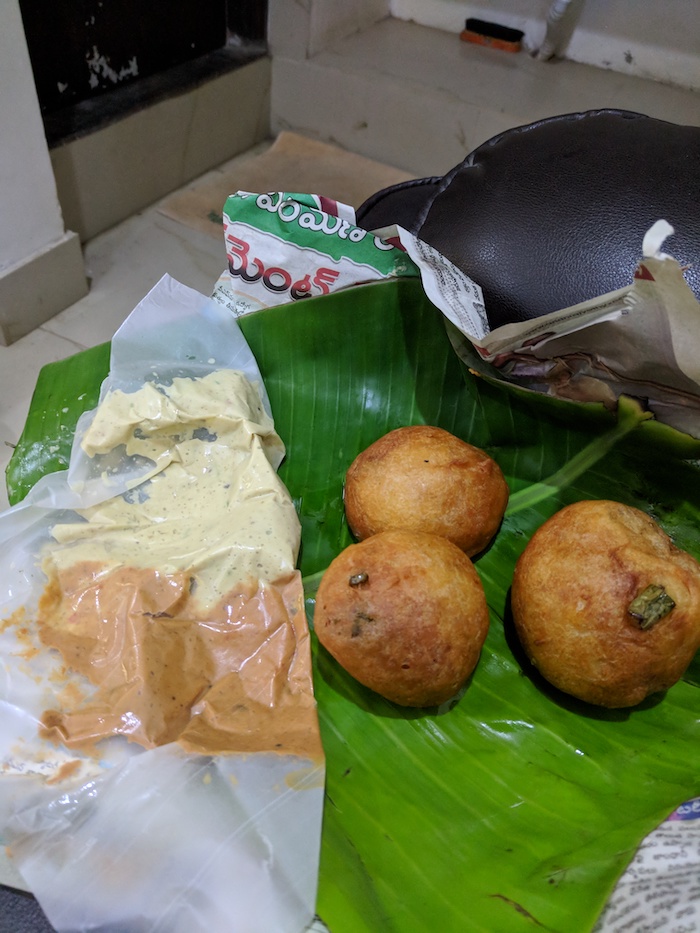 Breakfast in India, wrapped in newspaper and bannana leaves