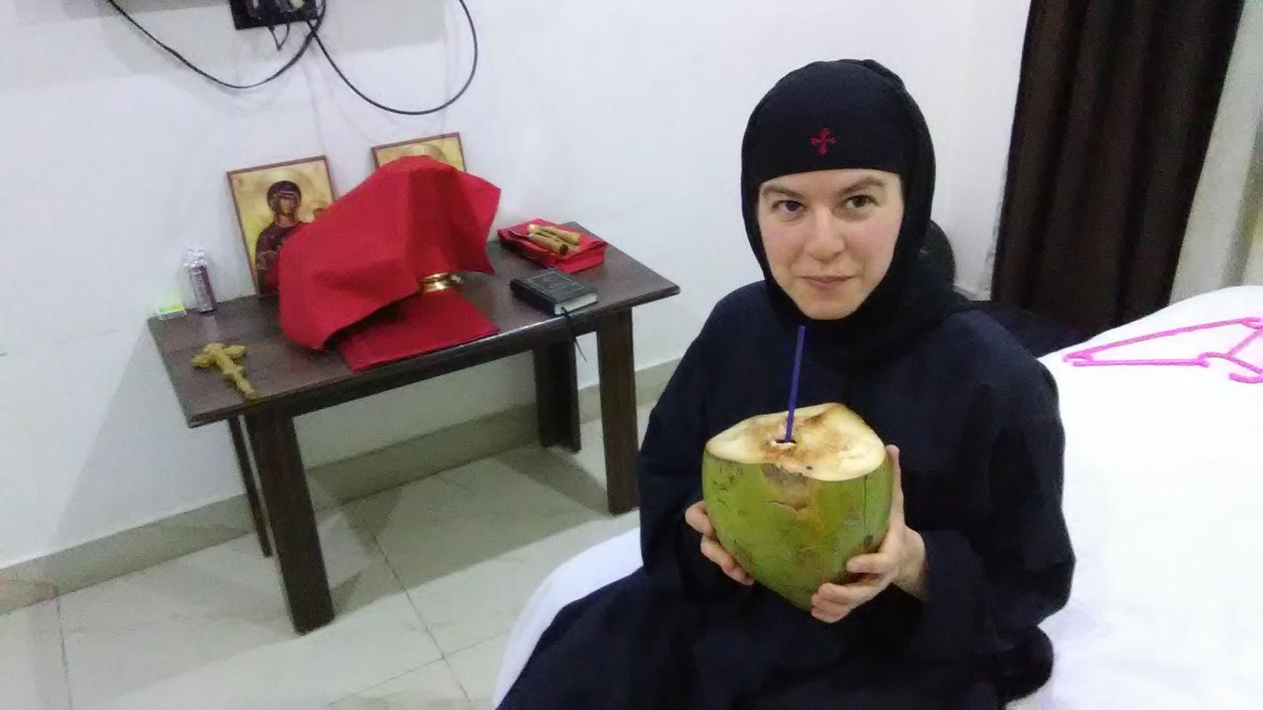 Enjoying coconut water back at the hotel